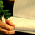 Someone writing in their diary