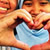 Thumbnail: Two girls making a heart shape with their hands